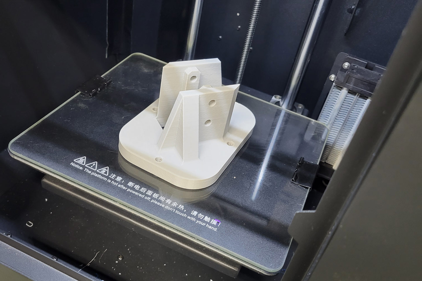 machine component on top of a 3 D printer