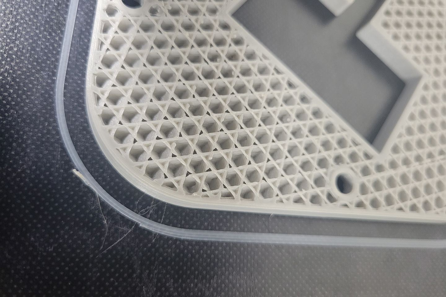 close up view of a machine component produced by a 3 D printer